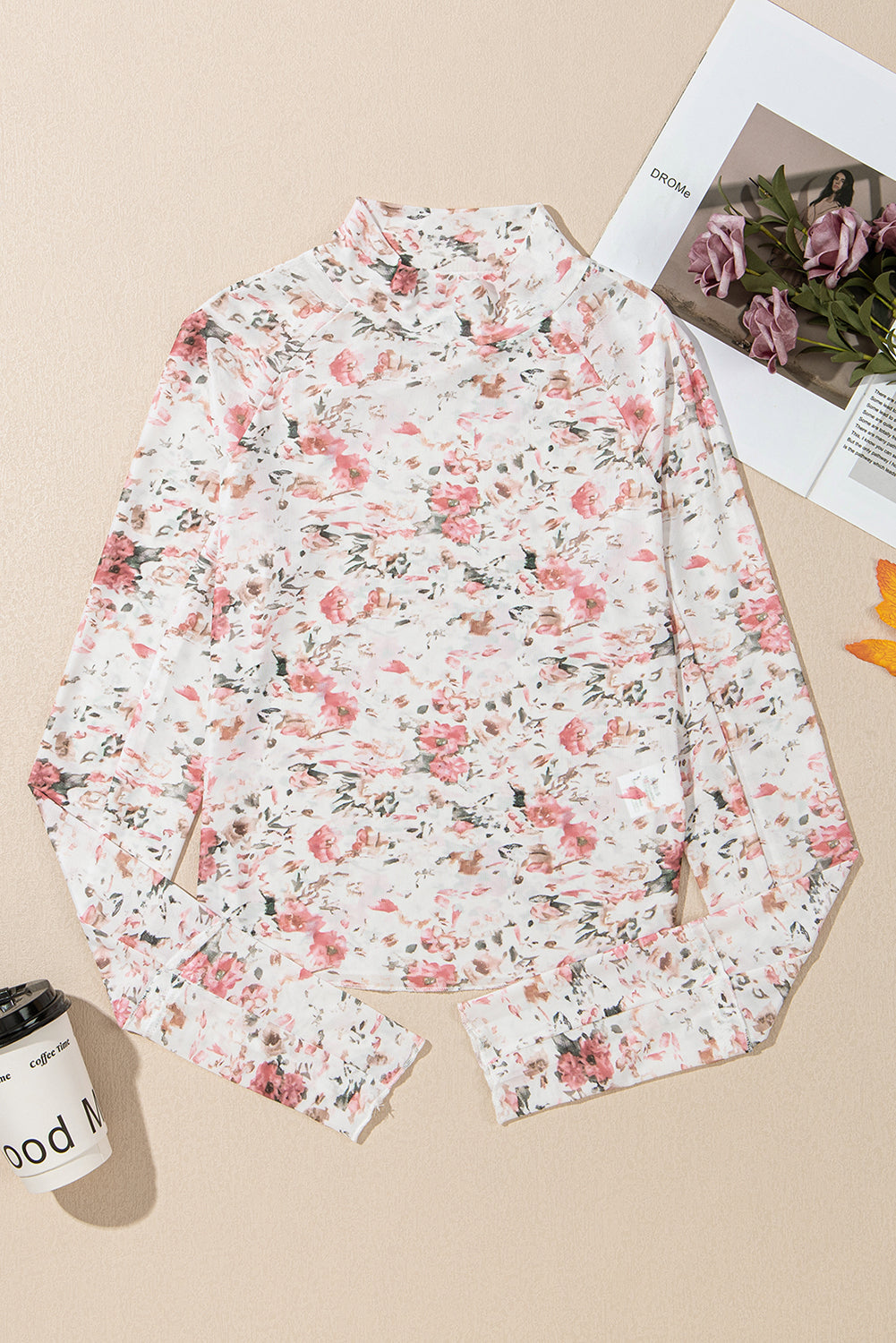Pink Floral Long Sleeve Mesh Top with thumbholes.