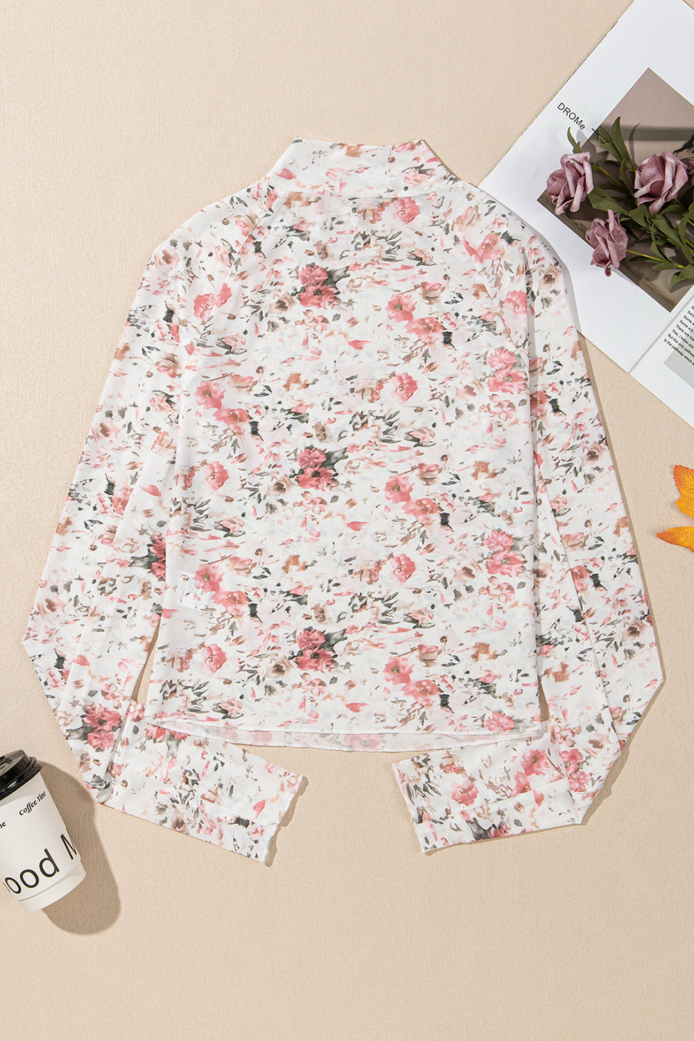 Pink Floral Long Sleeve Mesh Top with thumbholes.